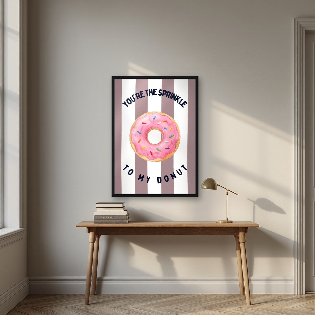 You're the Sprinkle to My Donut – Tuscan Taupe in a black frame, above an oak writing desk
