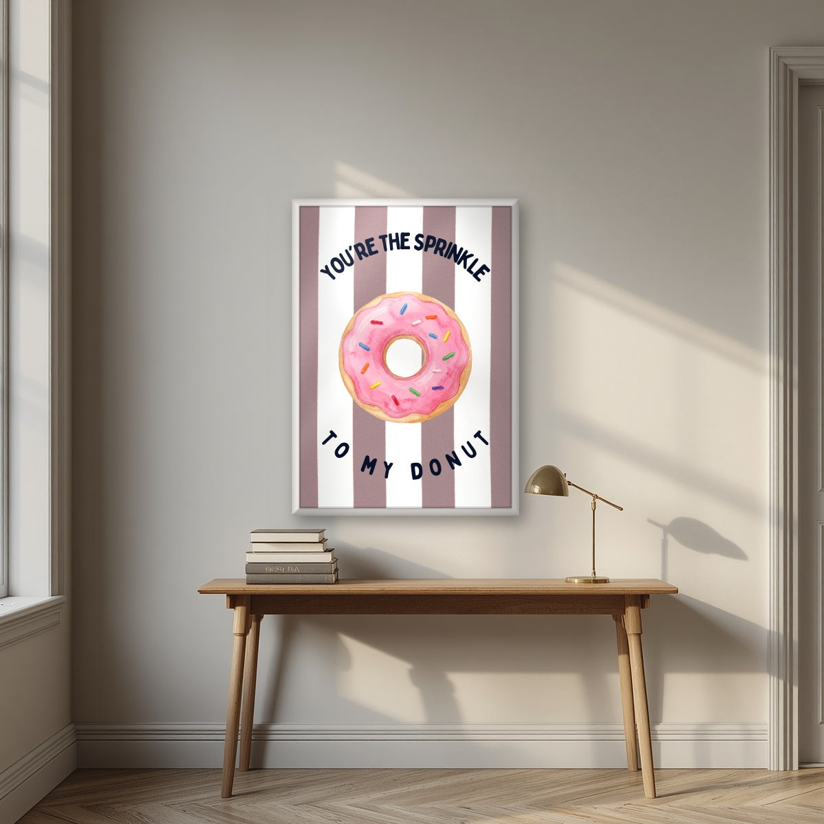 You're the Sprinkle to My Donut – Tuscan Taupe in a white frame, above an oak writing desk